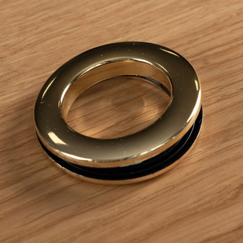 Przelotka plastikowa Uniwersalna, 10szt.,śr wew 35,5mm zewn. 57,5mm, kolor mosiądz 031 PRZELO/PLA/031/004004/1